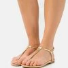 Patrizia Pepe T-bar Sandals - Gold Star 1 Patrizia Pepe T-bar Sandals - Gold Star -Patrizia Pepe Shop f66c8fc957ec40c799529b4dfb1f8590